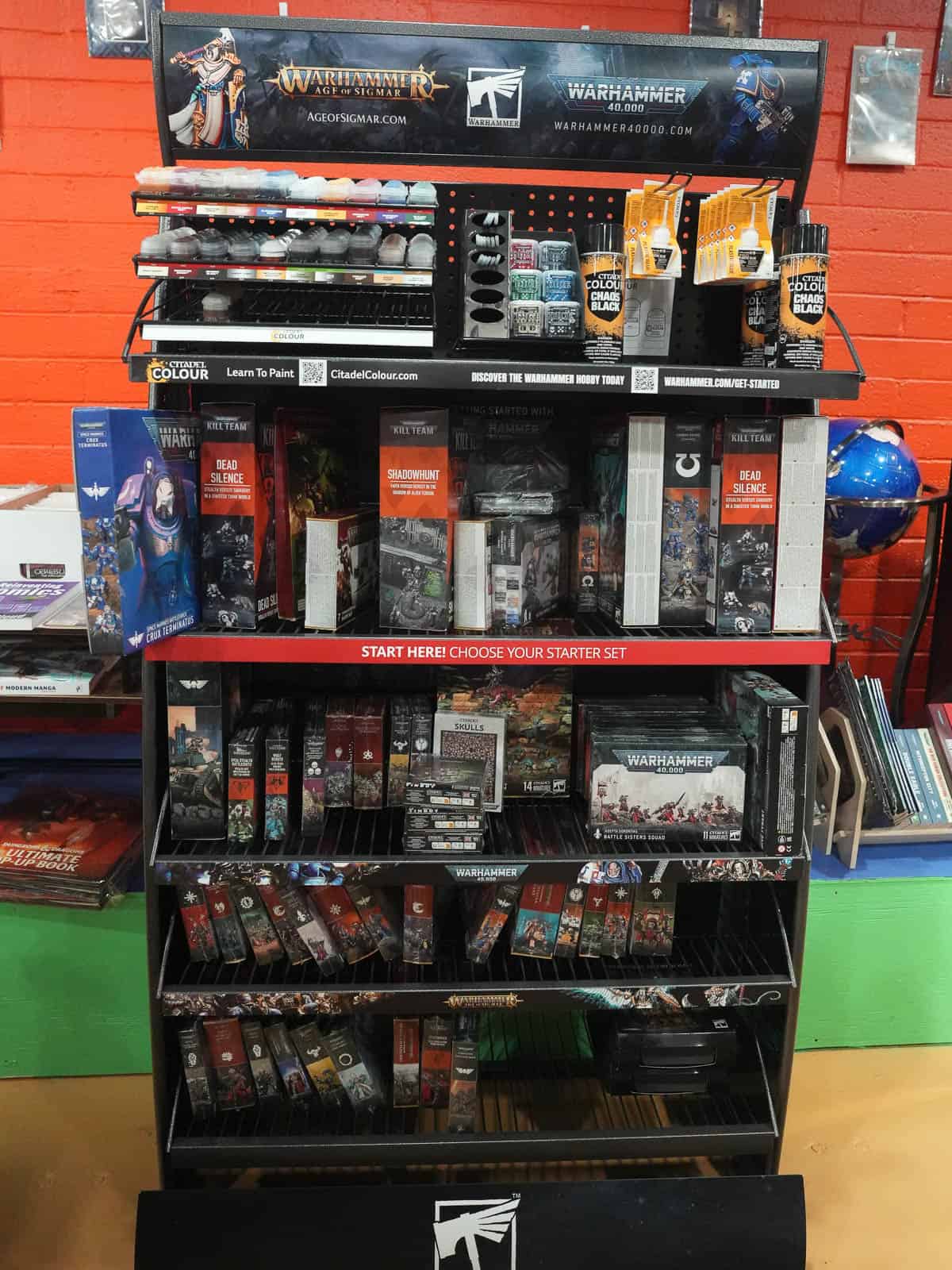 Display of Warhammer miniatures and Black Library books at Cult Fiction Bookshop.