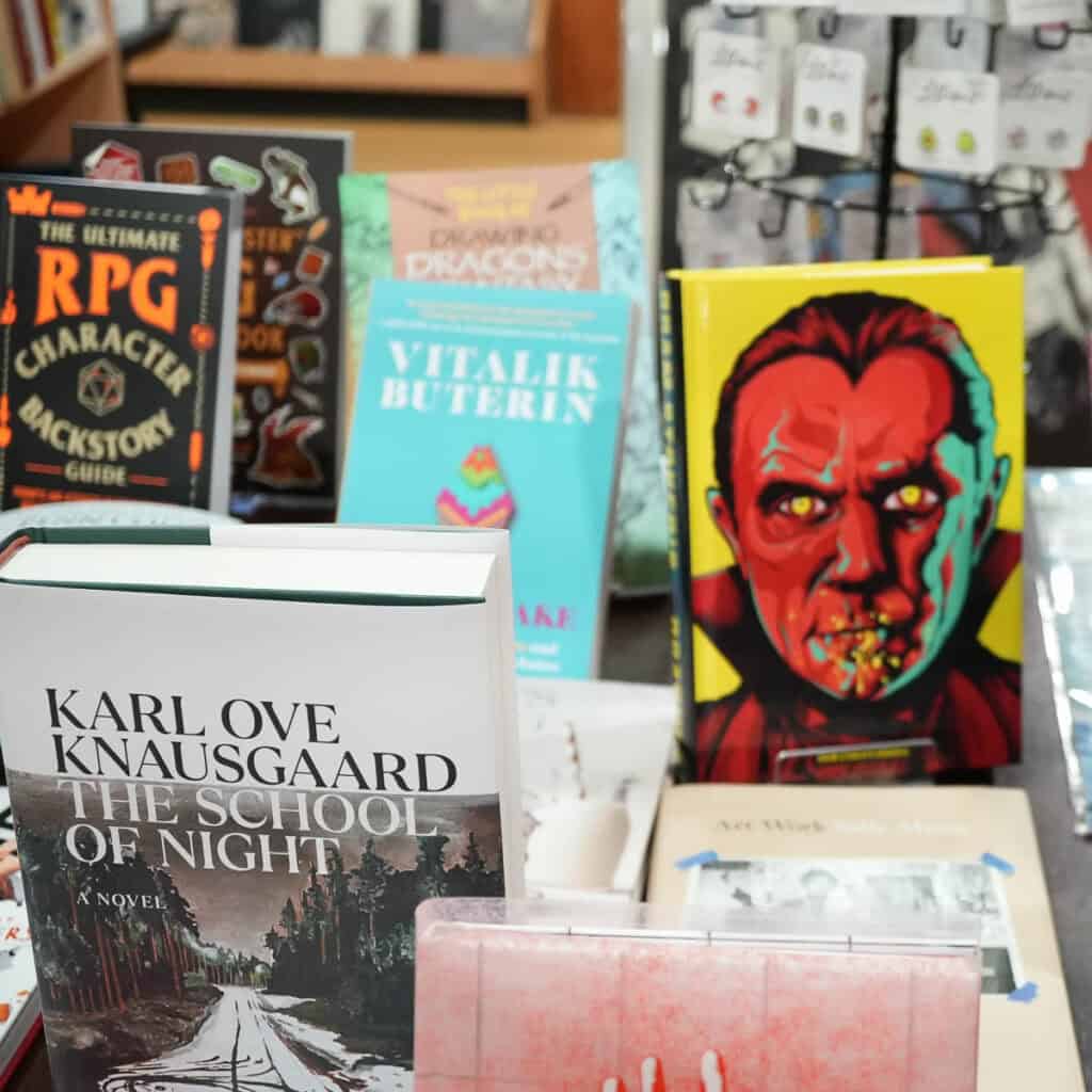 Display of horror, fantasy, and RPG books at Cult Fiction Bookshop.